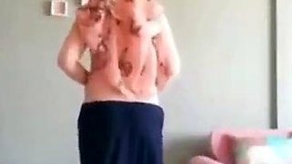 Turkish Arab in Hijab and Turban Performs a Striptease