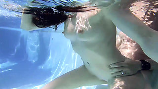Underwater fucking with a major creampie
