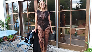 A Mature Woman Shows off Her Figure Outside in a Lace Bodysuit!