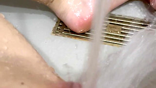 Oh She Loves to Masturbate with a Stream of Water Until She Orgasms