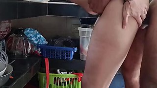 Stepmom was cooking in a thong, when he came up and pulled it down, to stick his dick in